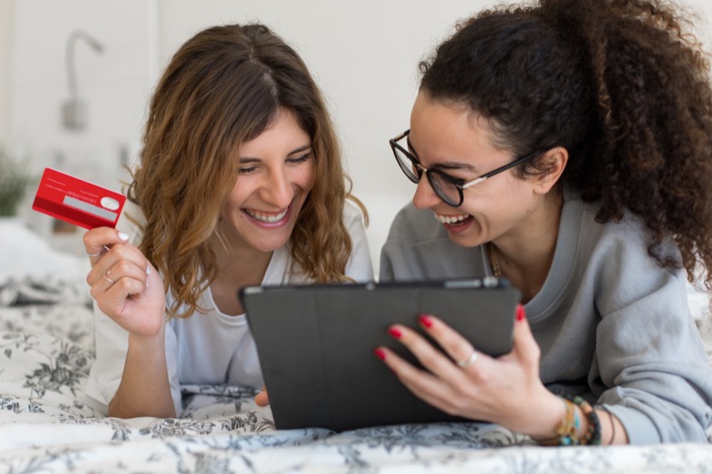 Credit Card Piggybacking: How It Works to Help Build Credit